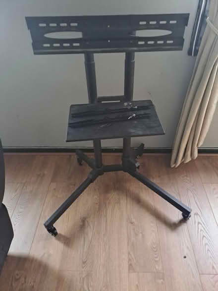 Photo of free Tv stand on wheels (S137TR) #1