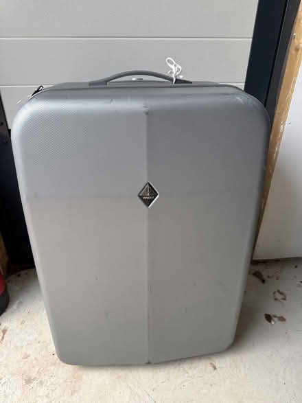 Photo of free 2 large grey hardshell suitcases (Littleham) #1