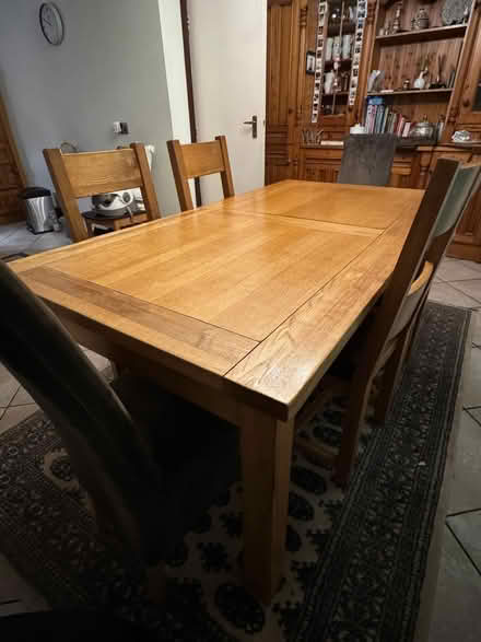 Photo of free Wooden extending dining table (Hale Barns, WA15 0EW) #1