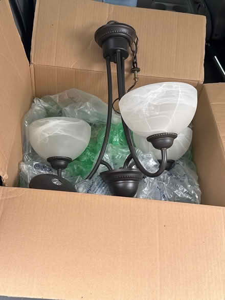 Photo of free 3 light bronze chandelier (Woodridge near Cypress Cove) #1