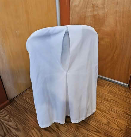 Photo of free 12 White Fabric Chair Covers (63033, off N. New Florissant) #1