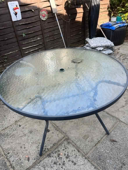 Photo of free Glass top garden table (Woking GU22) #1