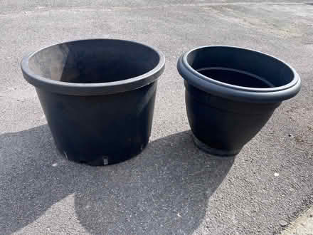Photo of free 2 large black plastic garden / plant pots (Bear Flat) #1