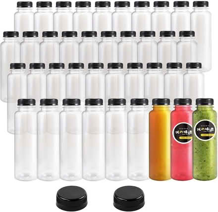 Photo of free 8oz Plastic Juice Bottles with Caps (Upper West side on 83rd) #1