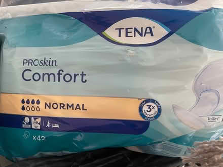 Photo of free Bin bag of Tena pads (Upper Malone, Belfast, BT9) #1