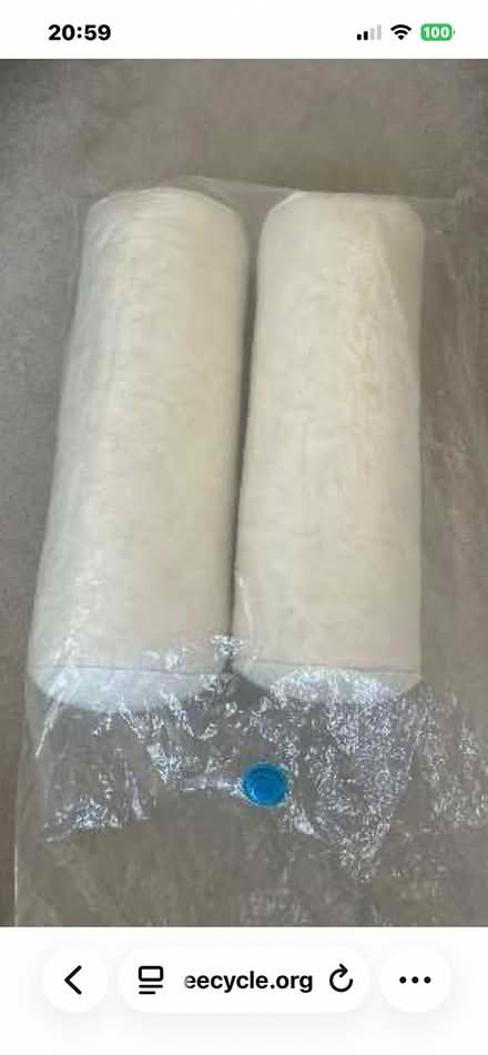 Photo of free 2 x feather bolster cushions (Brentwood station CM15) #1