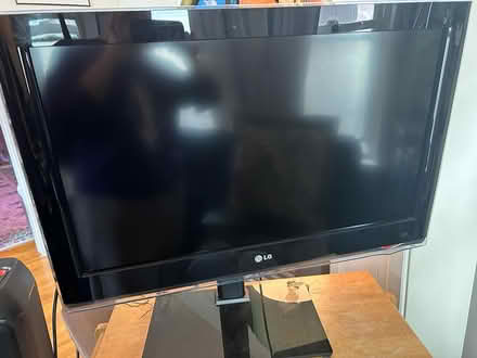 Photo of free Dumb TV + Stand (Tufts University) #1