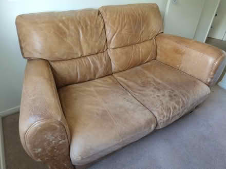 Photo of free Tan leather 2-seater sofa (Chiltern Park Ave, Berkhamsted) #1