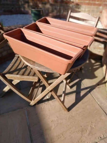 Photo of free Terracotta coloured plant troughs (Stone Cross) #2