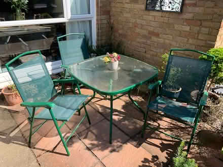 Photo of free Garden table and four green chairs (West Molesey.) #1