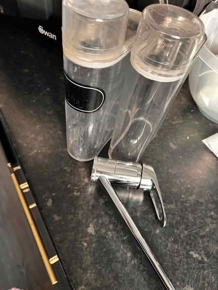 Photo of free Kitchen tap and pod storage containers (Goldington MK41) #1