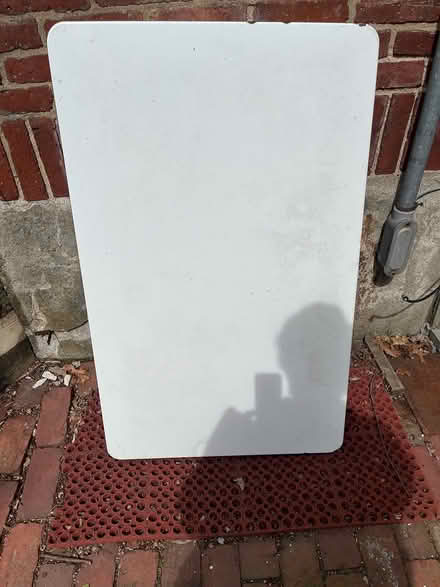 Photo of free Enamel topped work table (94 Coolidge Road Arlington) #1