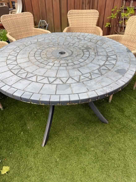 Photo of free Stone topped garden table (Urmston) #1