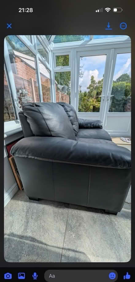 Photo of free Black 2 seater sofa (Dursley) #1