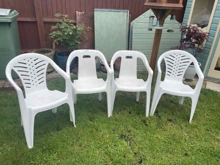 Photo of free White plastic garden chairs (Gloucester) #1