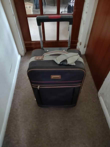 Photo of free Black suitcase on wheels (Hollingwood S43) #1