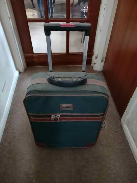 Photo of free Green suitcase on wheels (Hollingwood S43) #1