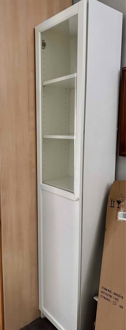 Photo of free Tall, slim, white display unit (Rochester, ME1) #1
