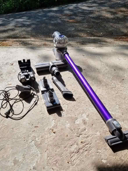 Photo of free Dyson vacuum with charger batteries, attachments etc (Wennington LA2) #1