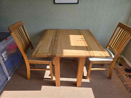 Photo of free Solid Oak Dining table & 2 chairs (Sutton Farm) #1