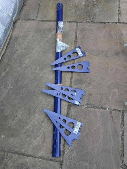 Photo of free Blue metal ladder rack and supports for 3 shelves (Fulham Palace Rd SW6) #1