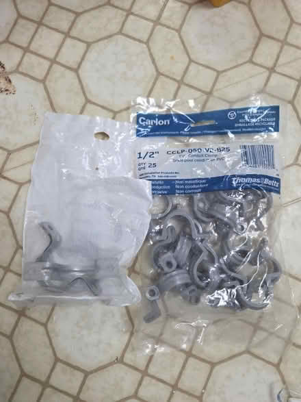 Photo of free 1/2" PVC conduit clamps (Foster Farm) #1