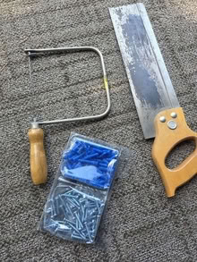 Photo of free hand saws, coping saw, anchors with screws #1