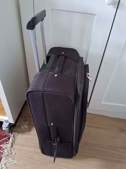 Photo of free Black wheeled suitcase 16'' wide 25" tall (Hove Station area BN3) #2