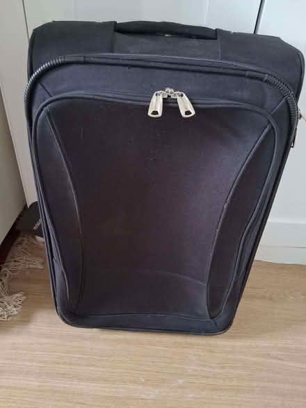Photo of free Black wheeled suitcase 16'' wide 25" tall (Hove Station area BN3) #3