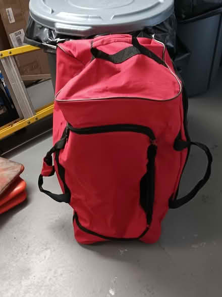 Photo of free Large red rolling duffle (Beacon Hill) #1