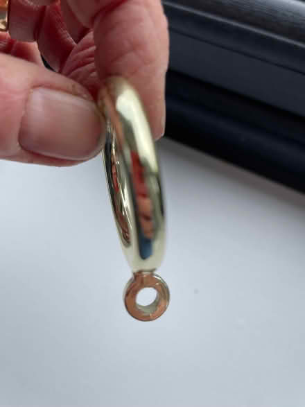 Photo of free Brass effect curtain rings (Lawford CO11) #1
