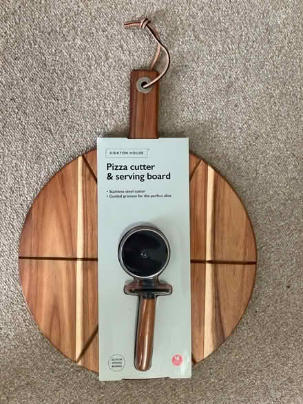 Photo of free Pizza serving board w/cutter (Streatham SW2) #1