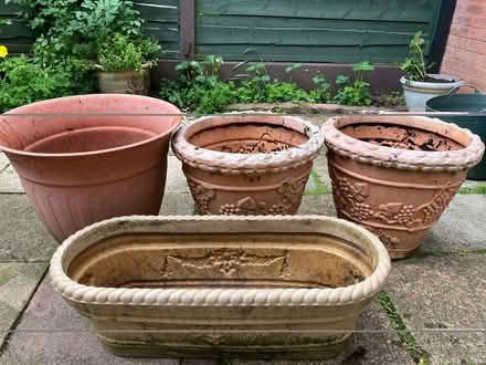 Photo of free 4 large plastic garden pots (Broken Cross area) (Deerwood Close SK10) #1