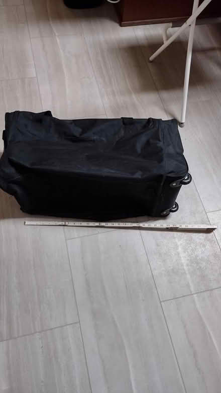 Photo of free Black rolling duffel (Springfield 19064) #1