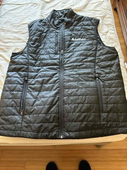 Photo of free Black quilted vest jacket (Oakland) #1