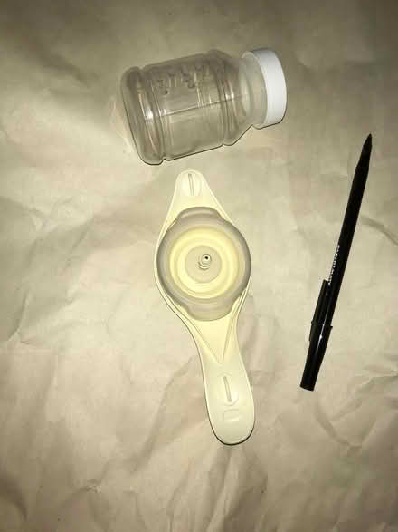Photo of free Medela lid and Milk Storage Bottle (Downtown Mountain View) #1