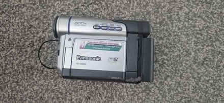 Photo of Camera battery or charger (Wd64tb WD6) #1