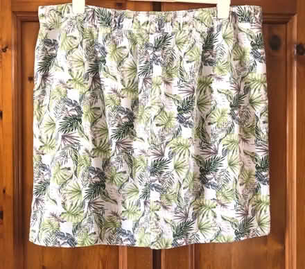 Photo of free Cream & green tropical print mini skirt, size 20. (Great Harwood BB6) #3