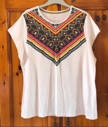 Photo of free White and multicoloured T shirt. Size 20 (Great Harwood BB6) #1