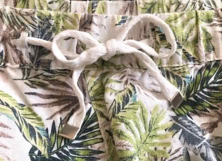 Photo of free Cream & green tropical print mini skirt, size 20. (Great Harwood BB6) #4