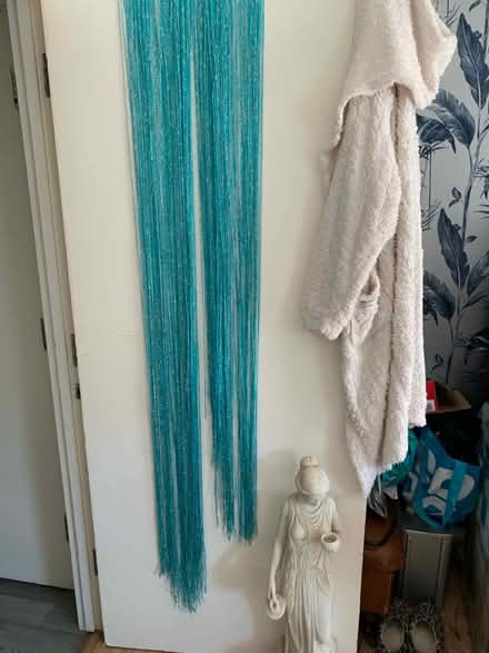 Photo of free 2 turquoise fly curtains (Worcester Park KT4) #1