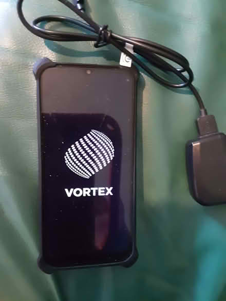Photo of free REPOSTING - Phone, Case & Charger (US19 & Nursery Road) #1
