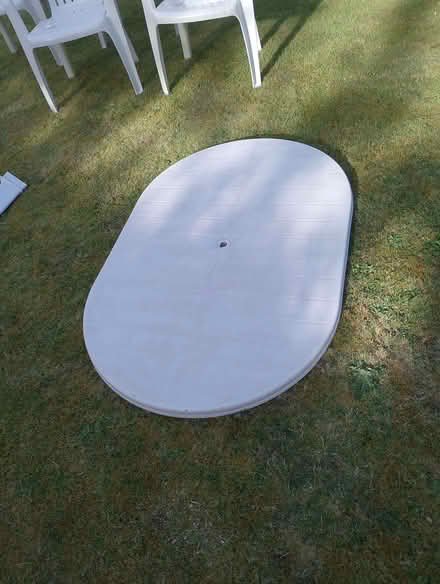 Photo of free White plastic patio set - 4 seats & oval table (Parkhead S11) #3