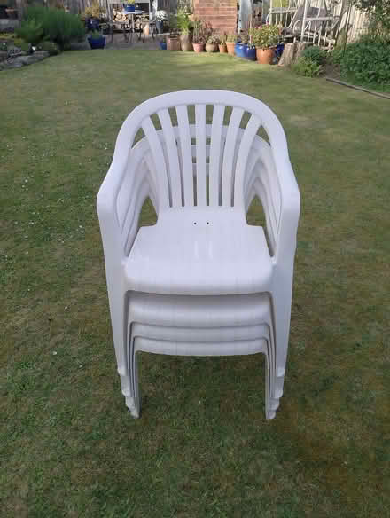 Photo of free White plastic patio set - 4 seats & oval table (Parkhead S11) #4