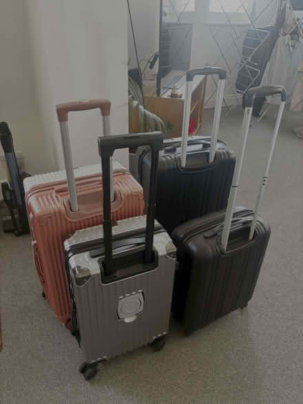Photo of free 4 suitcases - x2 small x2 medium (Clapham SW8) #1