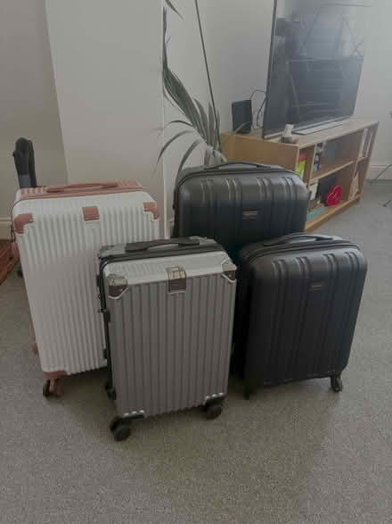 Photo of free 4 suitcases - x2 small x2 medium (Clapham SW8) #2