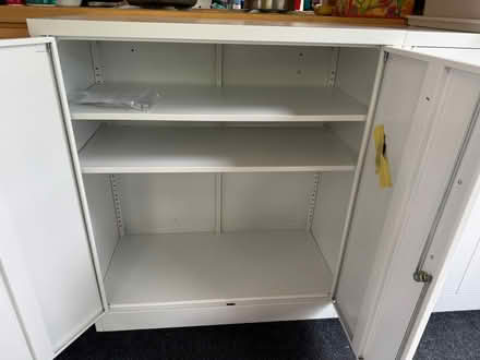 Photo of free 2 White Storage Cabinets NEW (Lafayette) #2