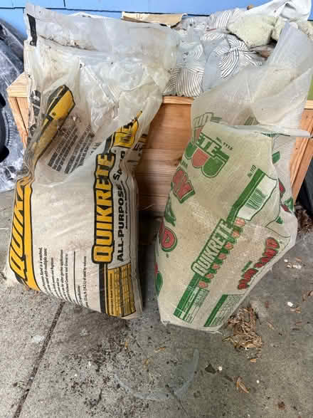 Photo of free 2 50lb bags of sand (Roxbury) #1