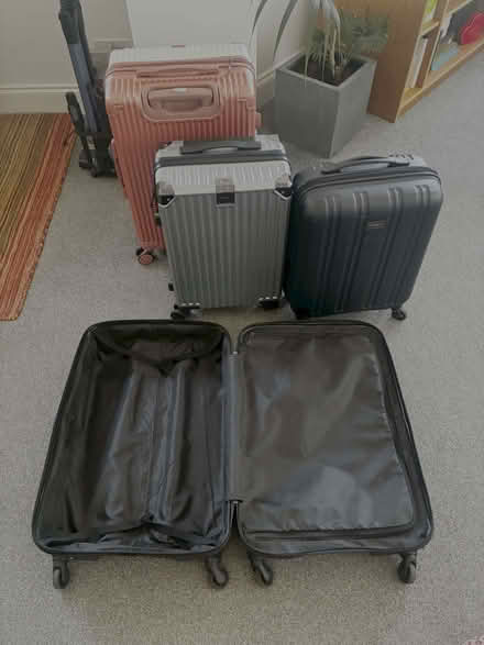 Photo of free 4 suitcases - x2 small x2 medium (Clapham SW8) #3
