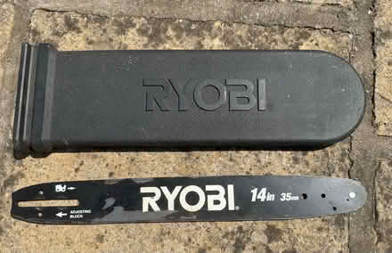 Photo of free 14” chainsaw bar and protective cover (Leckhampton GL53) #1